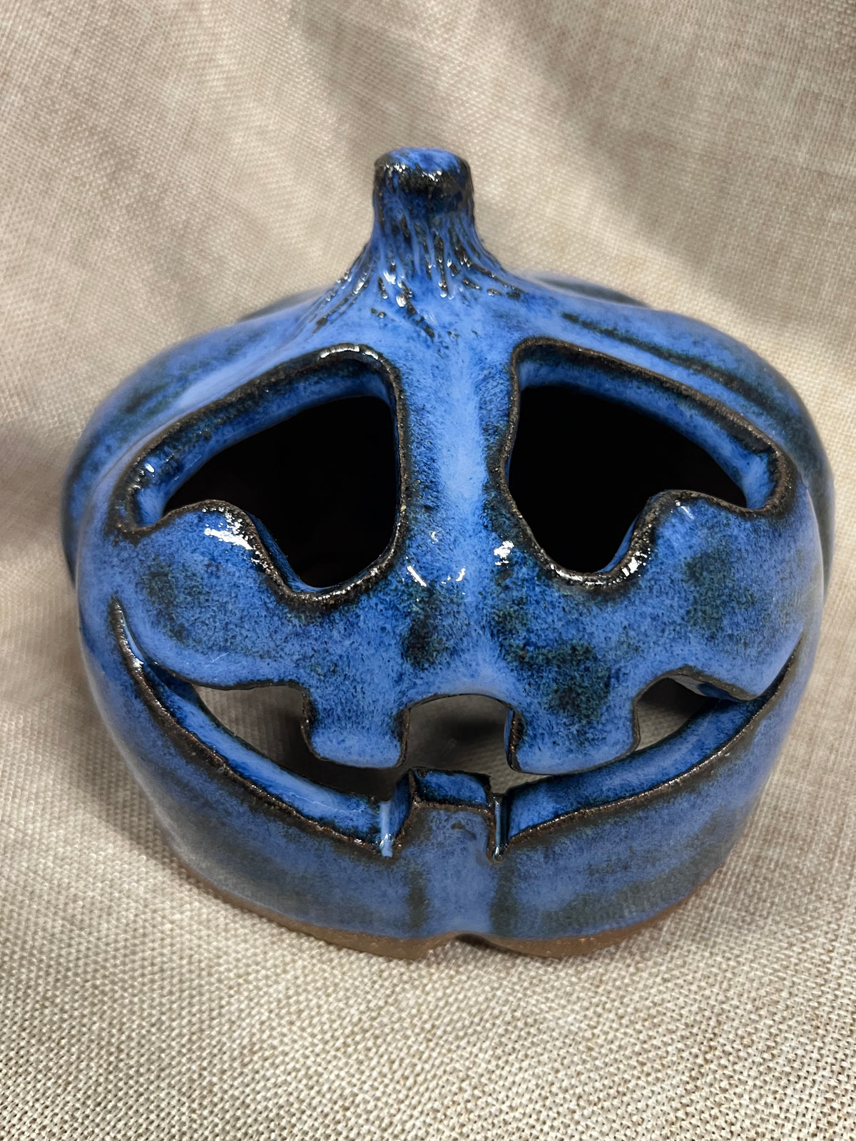 Grinning Blue Ceramic Pumpkin